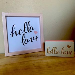 “Hello Love” signs.